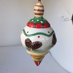 Ceramic Christmas ornament with pine cones